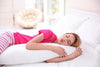 Peaceful woman in the best sleep position on pillow